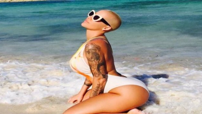 Ja pse Amber Rose ka të pasme të mëdha (Foto)
