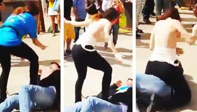 Ai e ngacmon në rrugë, ajo nxjerr gjoksin dhe e sulmon (Video)