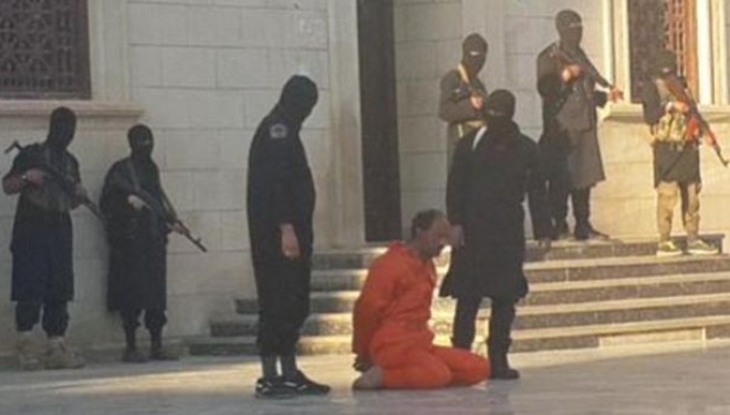 ISIS pret kokën e një personi para fëmijëve për ‘qëllime edukative’ +18 (Foto)