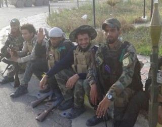 Me kokë të prerë në dorë, a është ky terroristi i sulmeve në Paris që kërkoi azil në Preshevë? (Foto +Video)