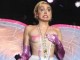 Miley Cyrus topless dhe me marihuanë (Foto+16)