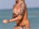 Jemma Lucy topless, me zogun e mbuluar me shqiponjë dykrenare (Foto+18)