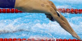 Ja përse atletët në “Rio 2016” kanë pulla të kuqe në shpinë